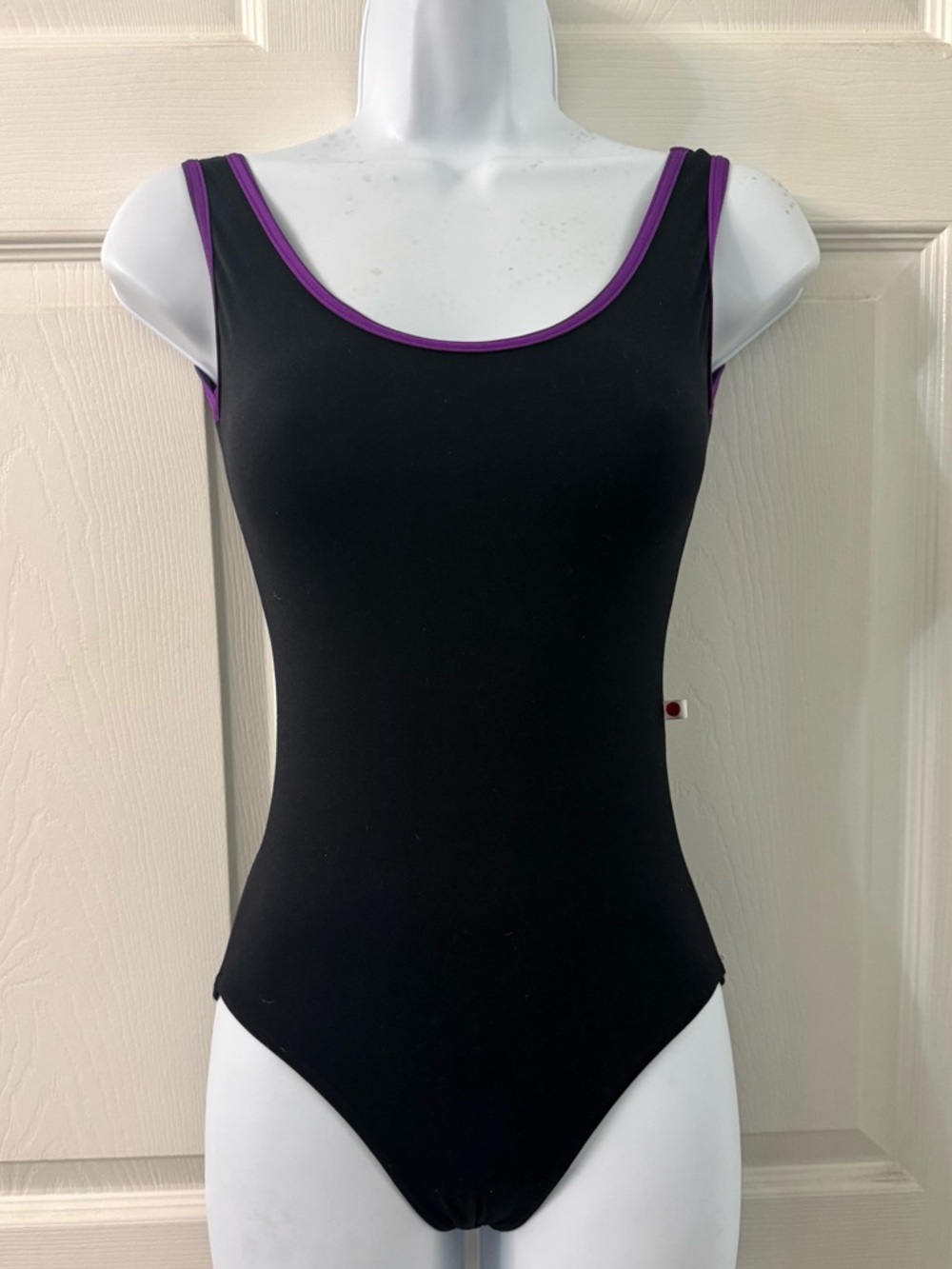 Yumiko Black Leotard with Purple Trim. Size S.